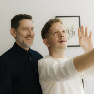 Photo of Jarren MacDougall (he/him) & Parker McLean (he/they)